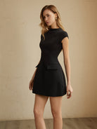Black Serilda Belle Luxe A-line mini dress by Lumina Vancouver featuring a stylish, fitted silhouette and elegant design.