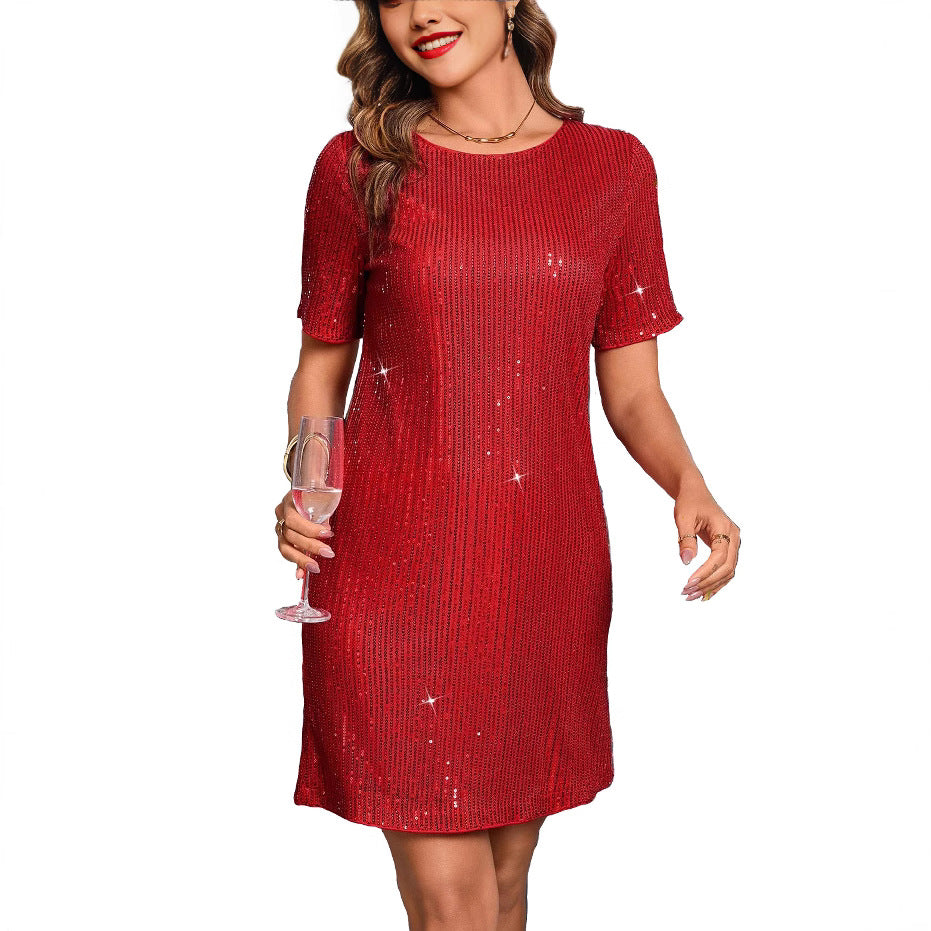 Black Josephine mini dress by Lumina Vancouver with scoop neckline and sequin embellishments, shown on a hanger.