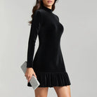 Black Lumina Vancouver Willa velvet mini dress with high neck and long sleeves, shown in XL size.