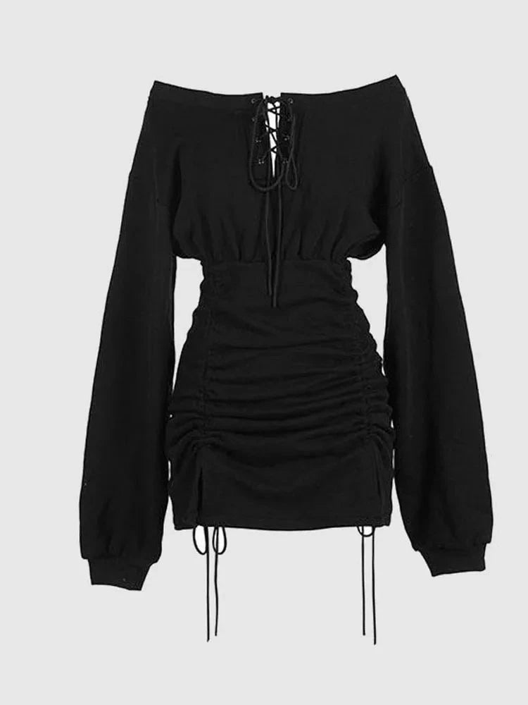 Black Wendeline off-shoulder mini dress by Lumina Vancouver, featuring a fitted silhouette and stylish short sleeves.