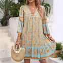 Blue Isabella Celeste Moonlight boho mini dress by Lumina Wear, featuring flowing fabric and bohemian style.