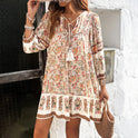 Blue Isabella Celeste Moonlight boho mini dress by Lumina Wear, featuring flowing fabric and intricate design details.