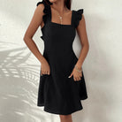 Lumina Vancouver Freyja mini dress in claret with fit and flare style, shown in size XS on a model.