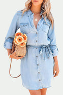 Deep blue Zoe denim shirt dress by Lumina Wear, button-down mini dress with long sleeves and casual style, front view.