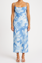 Green Magnolia Serenade bodycon mini dress by Lumina Vancouver, fitted style with elegant design.