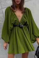 Green Camellia Lantern-Sleeve Mini Dress with deep V-neck by Lumina Wear, showcased on a model against a neutral background.
