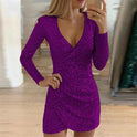 Lumina Wear Nova grey bodycon mini dress with deep V-neck, form-fitting design, worn by a model standing indoors.