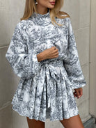 Lumina Vancouver Primrose A-Line mini dress in grey Toile de Jouy print, featuring a stylish and feminine design.