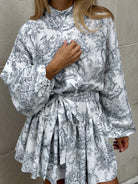 Lumina Vancouver Primrose mini A-line dress in grey toile de Jouy print, perfect for stylish, casual wear.