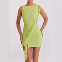 Light green Lumina Astra bodycon mini dress, sleeveless and backless design, shown on a model.