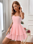Light green Lumina Vancouver sleeveless mini dress with a fitted silhouette, showcased on a white background.
