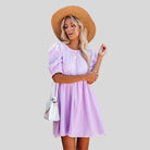 Lumina Vancouver Lempi Celeste Moonshadow mini dress in orange, short length with a stylish moonshadow design, size XS.
