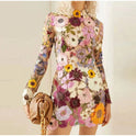 Lumina Wear Zenobia mini dress with pink and red floral embroidery, showcasing a stylish, lightweight floral mini dress.
