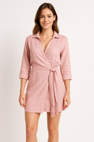 Pink Lumina Vancouver Tuuli Cotton Linen Wrap Mini Dress with short sleeves and a fitted waist, casual and stylish for warm weather.