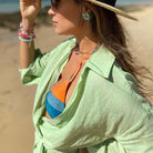 Pink Lumina Vancouver Tuuli Cotton Linen Wrap Mini Dress with long sleeves and adjustable waist for a stylish, comfortable look.