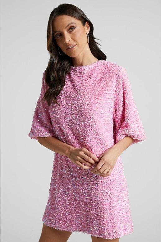 Pink Isolde plunge-back sequin mini dress by Lumina Vancouver, featuring shimmering embellishments and a fitted silhouette.