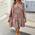 Purple Nova short dress by Lumina Wear featuring a rayon floral print and a mini dress silhouette.