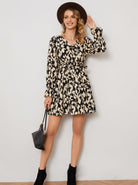 Lumina Vancouver Raili A-Line Mini Dress with V-Neck, showcasing a stylish, fitted silhouette and elegant design.