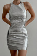 Silver Lumina Wear Vigdis Nova Couture halter mini dress with a fitted silhouette and stylish design, shown on a model.