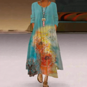 Watercolor-inspired Aurelia casual long sleeve mini dress by Lumina Wear, featuring a flowing silhouette and soft fabric.
