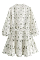 White and green Marin Willow wrap dress with V-neck from Lumina Vancouver, stylish mini dress for casual or semi-formal wear.