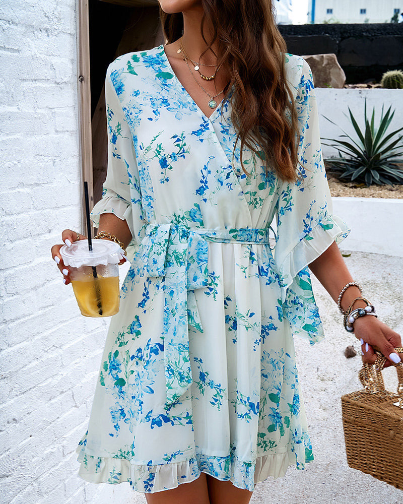 Lumina Vancouver Alba women's floral V-neck mini dress in white, featuring a lightweight, elegant design for casual or semi-formal wear.