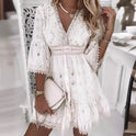 Isadora Moonlight Muse white V-neck mini dress by Lumina Wear, stylish and elegant for casual or semi-formal occasions.