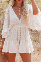 White women's romper with deep V-neck from Lumina Vancouver, styled as a mini dress, showcased on a model.