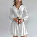 White Lumina Nova satin mini dress with deep V-neck, sleeveless style, fitted silhouette, and elegant fabric.