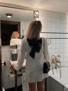 White Lumina Vancouver Lise sequin mini dress with long sleeves, featuring a fitted silhouette and elegant shimmer.