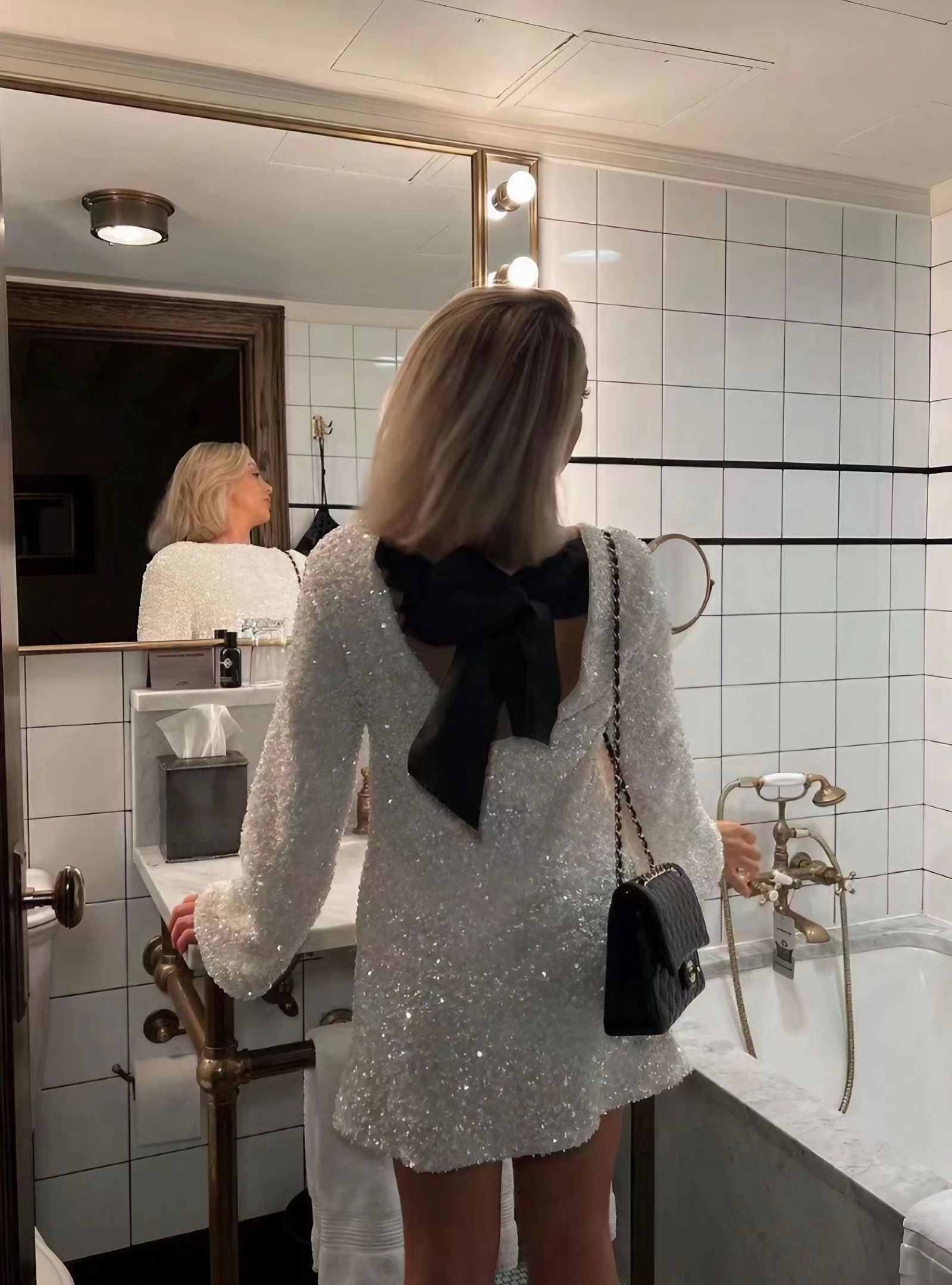 White Lumina Vancouver Lise sequin mini dress with long sleeves, featuring a fitted silhouette and elegant shimmer.