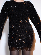 Lumina Vancouver Lise sequin mini dress with long sleeves in white, featuring a fitted silhouette and sparkling embellishments.