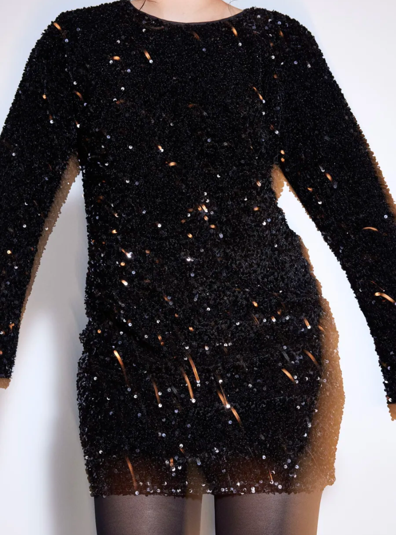 Lumina Vancouver Lise sequin mini dress with long sleeves in white, featuring a fitted silhouette and sparkling embellishments.