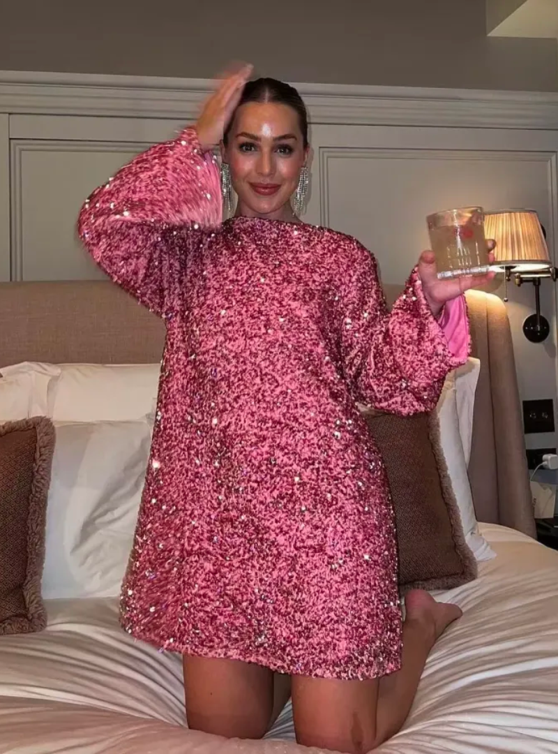 White Lumina Vancouver Lise sequin mini dress with long sleeves, fitted style, and elegant design for stylish occasions.