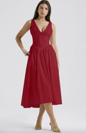 Yellow sleeveless mini evening dress with V-neck from Lumina Wear's Nova collection, featuring a floral pattern and fitted silhouette.