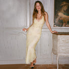 Lumina Vancouver Katarina slip dress in yellow satin finish, slim fit mini dress with elegant design and smooth texture.
