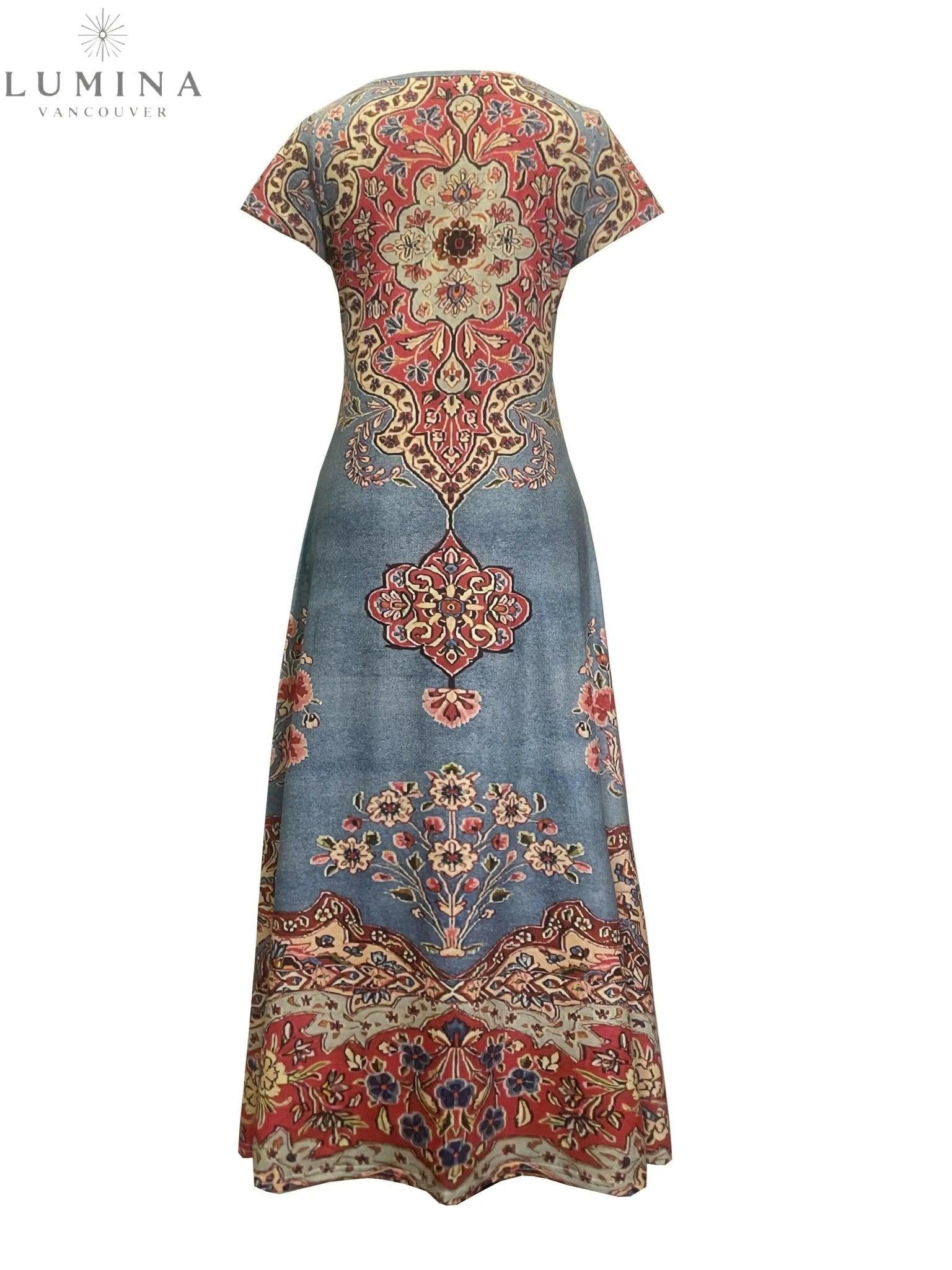 Lumina Vancouver Maya vintage floral dress in multicolor with short sleeves and a fitted waist, displayed on a dress form.