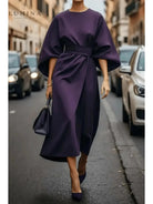 Navy blue Sonia elegant dress by Lumina Vancouver featuring a stylish belt, displayed on a mannequin.