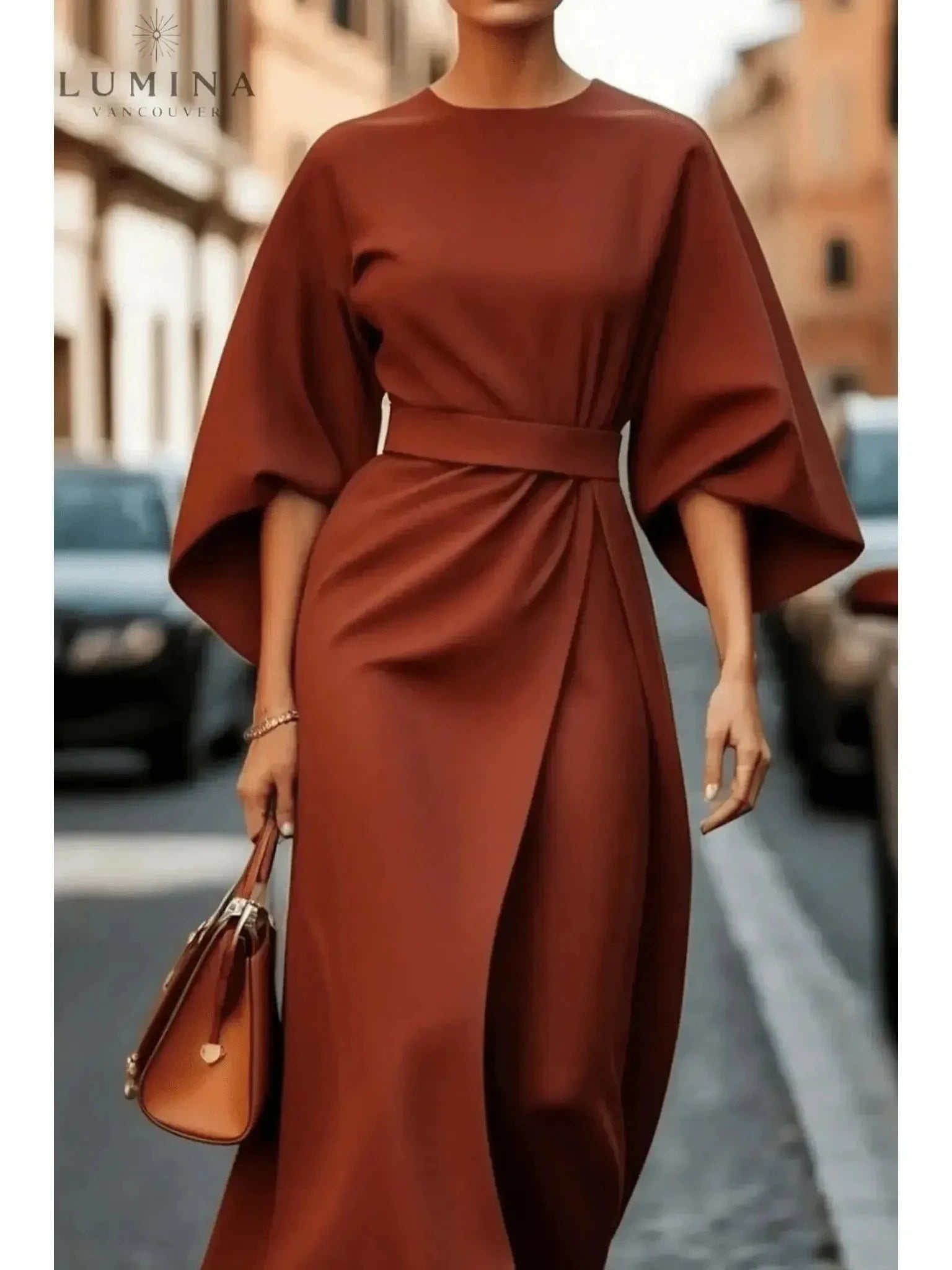 Navy blue Sonia elegant dress by Lumina Vancouver with a matching belt, featuring a fitted silhouette and stylish design.