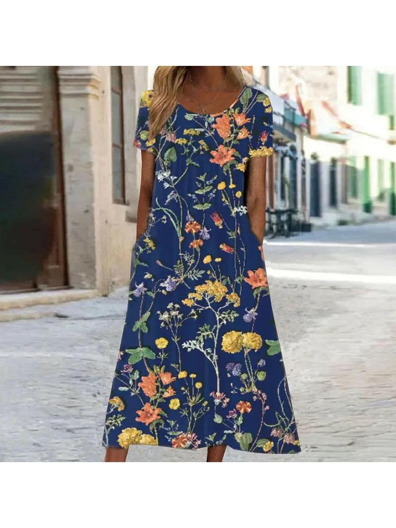 Lumina Vancouver Alya boho floral maxi dress in red with tummy coverage, elegant design and flowing fabric for stylish summer wear.