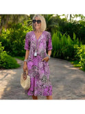 Lumina Wear Isla spring dress in vibrant red, featuring a stylish, lightweight design perfect for warm-weather wear.