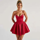 Red satin corset bodice mini dress by Lumina Vancouver, featuring a fitted design with elegant detailing.