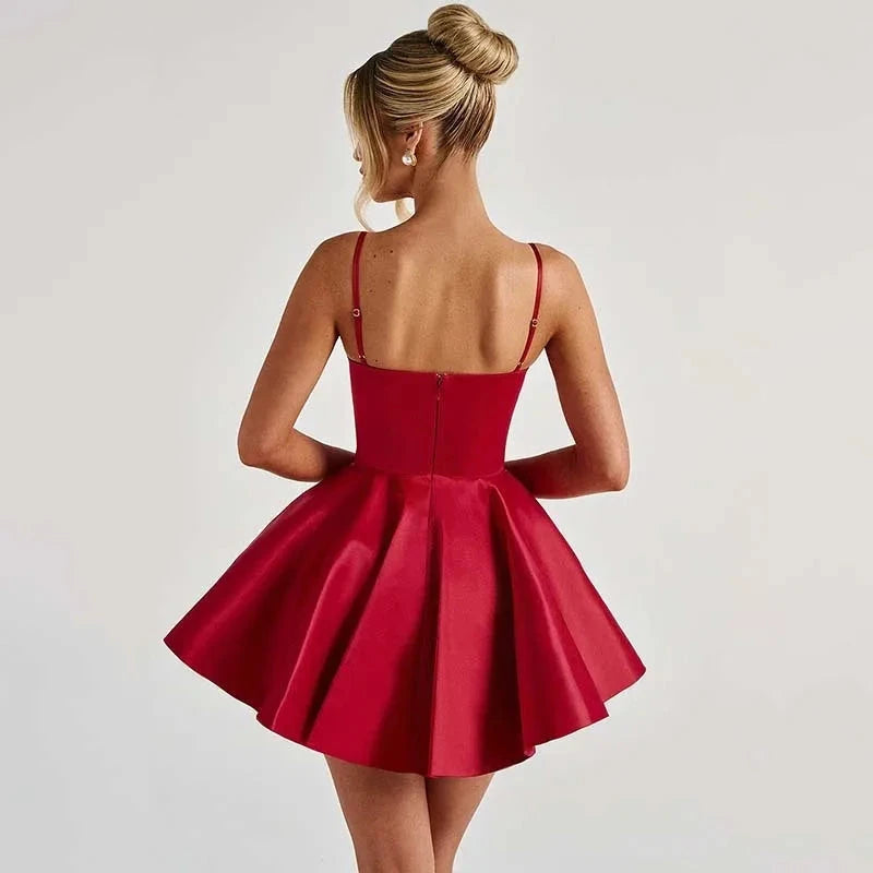 Red satin corset bodice mini dress by Lumina Vancouver, featuring a fitted silhouette and elegant design.