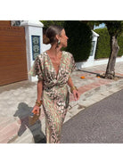 Lumina Vancouver Roxane long dress with twist V-neck, elegant evening wear in soft fabric with draped design.