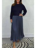 Sky blue Mariana long-sleeved dress by Lumina Wear, featuring a fitted silhouette and elegant design, shown on a model.