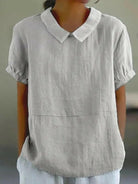 Blue plain short sleeve round neck top by Lumina Vancouver, stylish and comfortable casual women’s clothing.