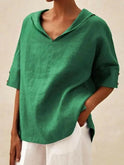 Blue women's V-neck casual blouse by Lumina Wear, featuring a relaxed fit and soft fabric, perfect for everyday wear.