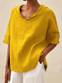 Blue women's casual V-neck blouse by Lumina Wear, featuring a relaxed fit and stylish design for everyday wear.
