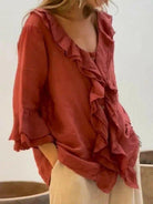 Women's ruffled casual cotton shirt with 3/4 sleeves by Lumina Vancouver, shown in blue with stylish ruffle details.