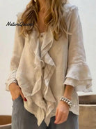 Blue women's ruffle casual cotton shirt with 3/4 sleeves by Lumina Vancouver, shown in a relaxed, stylish fit.